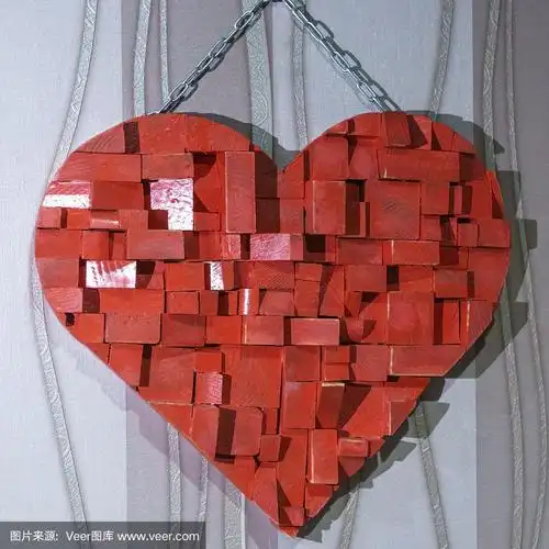 墙面背景上的红色方块心形装饰.情人节和爱情概念.