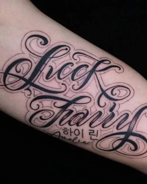 花体字纹身图片_手臂花体字纹身图案