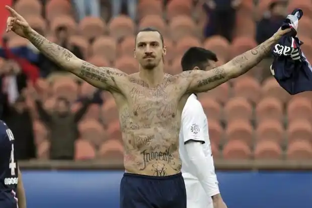 ibrahimovic earns yellow card after revealing chest