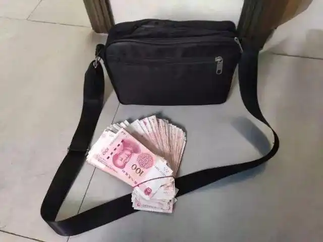 海口环卫女工等候2小时将2万多元现金归还失主!连央视都为她点赞