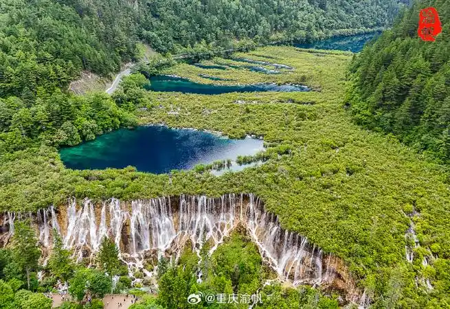 航拍九寨沟诺日朗瀑布,感受中国最美水景魅力,人间仙境名不虚传  "