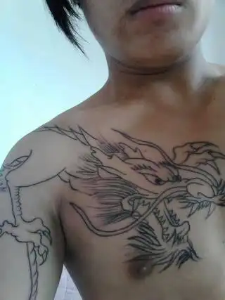 纹身纹龙有什么讲究?三爪,四爪,五爪随便?过肩披肩有什么不同.