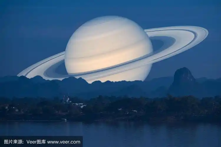 土星行星背面剪影河和山夜空的背景
