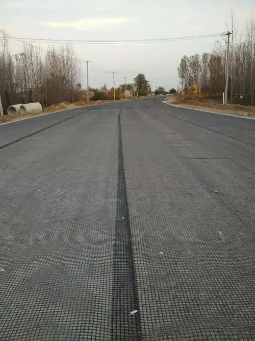 玻璃纤维土工格栅 水泥路面改沥青路面用延伸率低 自粘式玻纤格栅