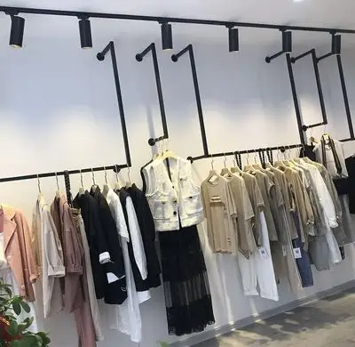 服装店陈列架上墙图片