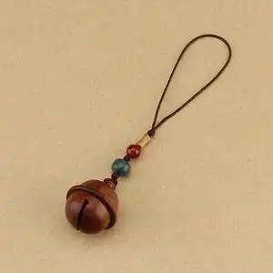 39jiajun0717淘宝手工创意桃木铃铛手机链挂件潮男女包挂饰品百搭