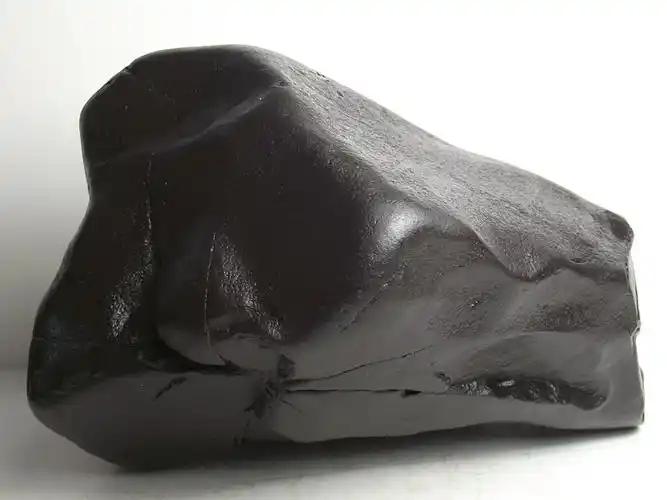 纯天然黑色石头原石保真保天然纯黑色