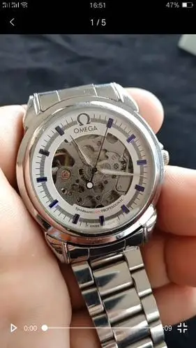 求懂的人帮我看看这块欧米茄 老款 真的假的?