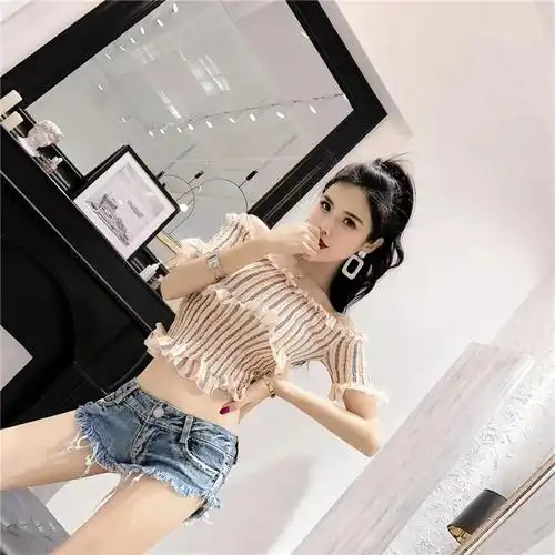 性感小众辣妹个性毛边超短牛仔三角裤女2024夏季款个性修身包臀裤