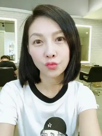 何润东老婆peggy剪短发