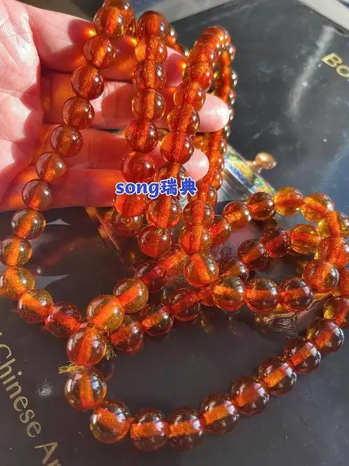 清代满冰裂纹蜻蜓翅琥珀朝珠108颗