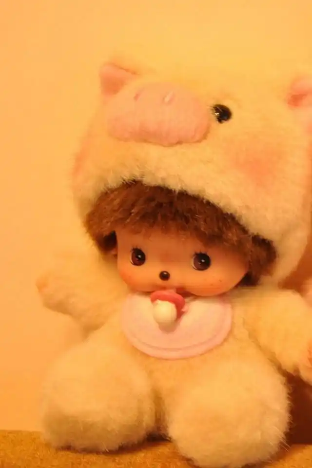 可爱时尚蒙奇奇公仔高清手机壁纸