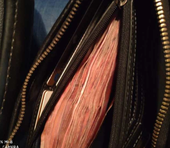 他捡到我的7000元多元现金和大量银行卡后,主动送