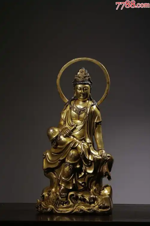 清"大明永乐年驰"款铜鎏金持经观音坐像摆件