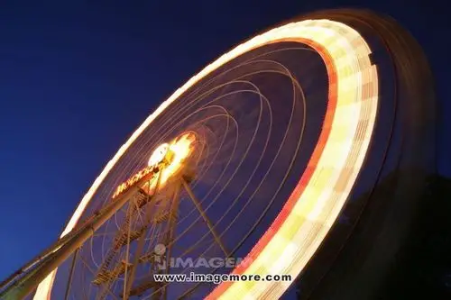 light trail of ferry wheel at night