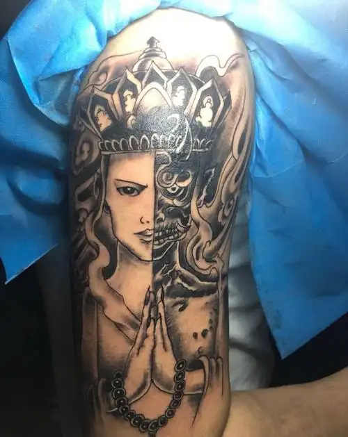 大臂一念之间纹身图片