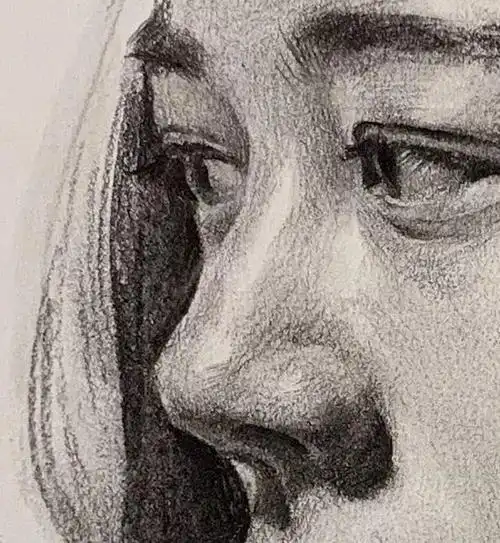 素描头像中长发侧颜女青年