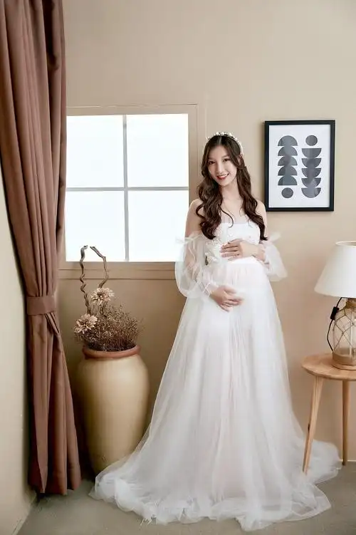 孕妇拍照服装影楼孕期大肚照写真透视礼服准妈咪白纱孕妇摄影服装