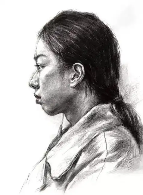 正侧面女青年素描头像照片正侧面素描头像结构绘画教程