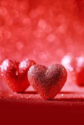 红色唯美爱心光晕情人节海报背景
