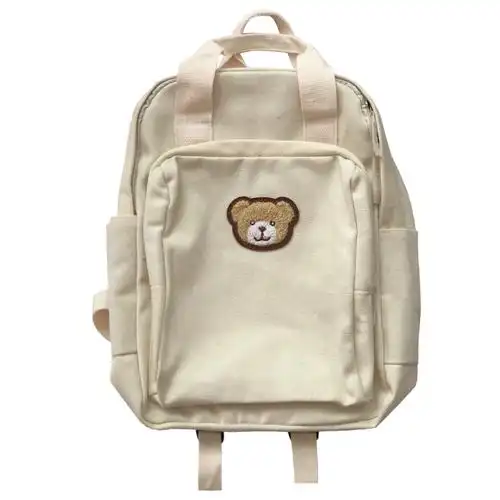 ins古着感少女学院风书包女日系原宿可爱小熊学生双肩包帆布背包米