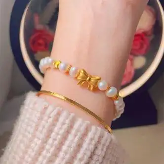 艾朵唯520礼物送男女友黄金在逃公主蝴蝶结手链女士足金转运珠铃铛