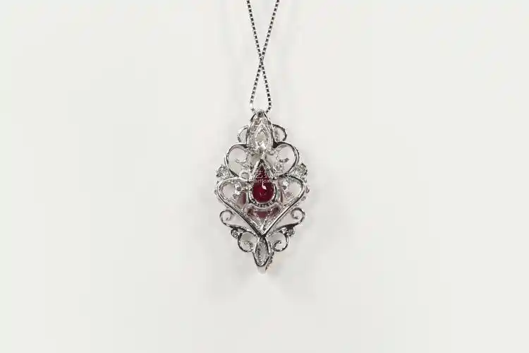18k金镶钻红宝石吊坠-【成交 价格 图片】