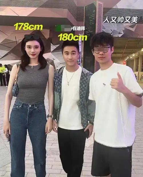 何猷君迪拜看展被偶遇全程护妻超恩爱身高差距被调侃像姐弟