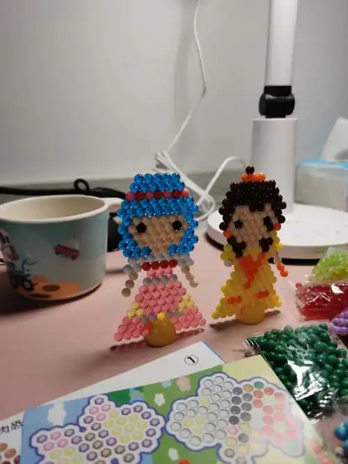 本来自己要拼好的水雾魔珠,结果爸爸非要陪玩06产生了图三的结果