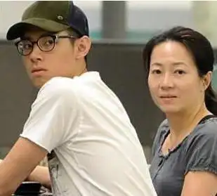 谭咏麟与原配杨洁薇粉丝朱咏婷三角孽缘何以原配遁入空门告终