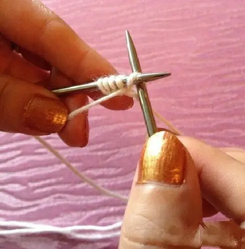 看到一个疙瘩,就是狗牙针.