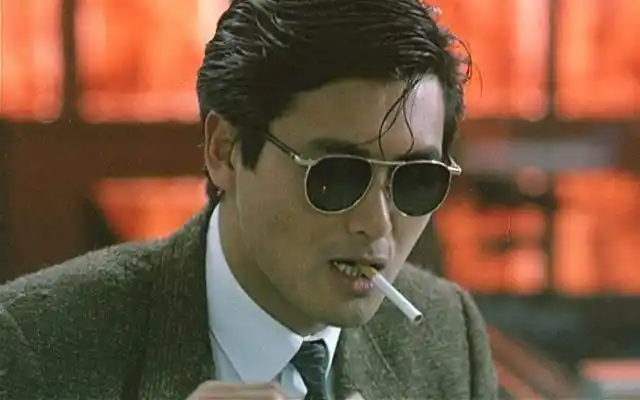 男二号是张国荣,周润发饰演的小马哥只是男三号