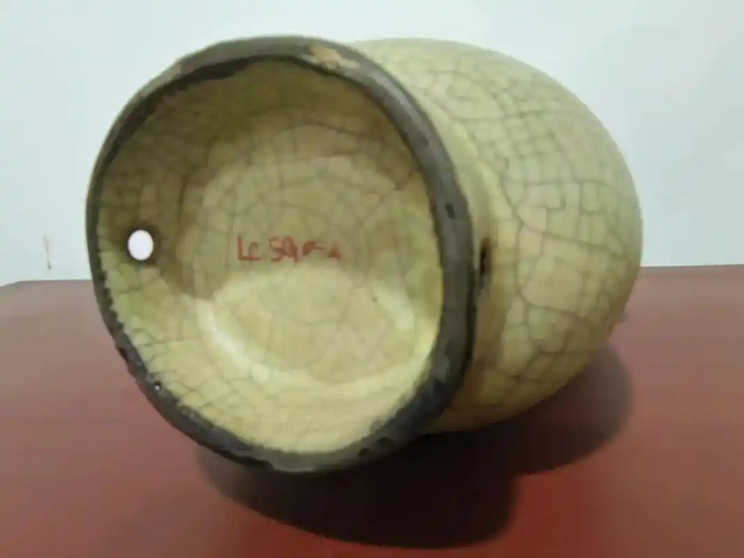 宋代哥窑浅米黄釉穿帶贯耳尊. - 抖音