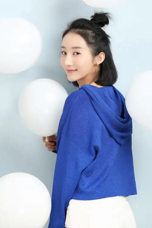 林田媛清甜写真曝光 "丸子头"定格活力本色