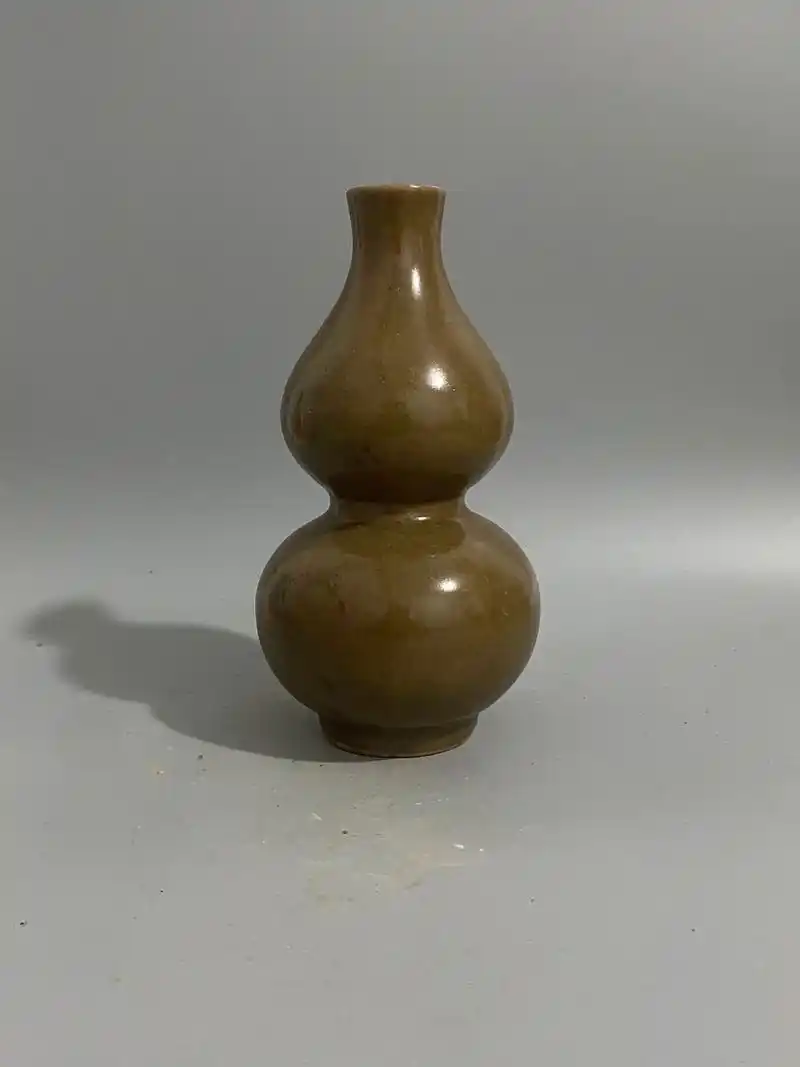 喜欢的藏友77关注询价…这件黄釉龙泉窑的葫芦瓶,为宋代器型之一