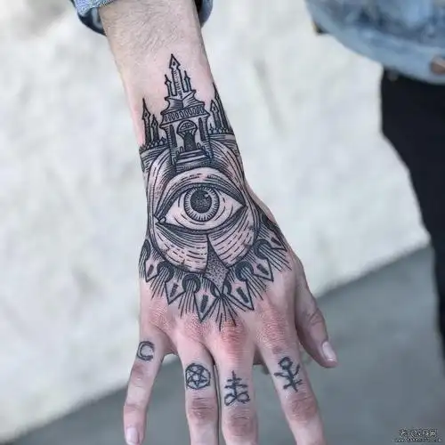 手背黑灰上帝之眼城堡纹身图案