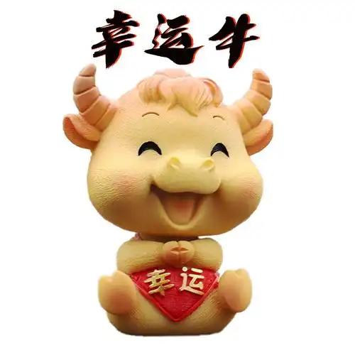 车载卡通摇头牛公仔摆件汽车中控台固体香薰可爱牛气冲天车内饰品