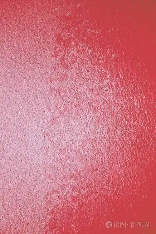 活珊瑚红色漆水泥概念暖墙背景纹理