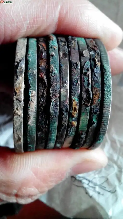 [讨论] 银元铁褐色锈的成因?