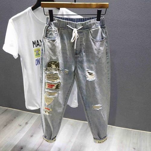 夏季痞帅水洗破洞做旧浅蓝九分牛仔裤男潮牌宽松哈伦乞丐束脚裤子