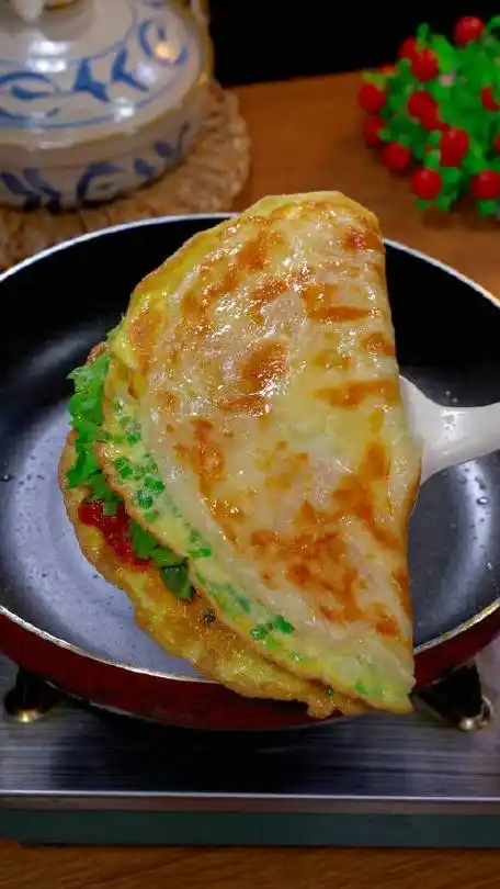 火腿鸡蛋饼做法#美食#素素小厨娘的微博视频