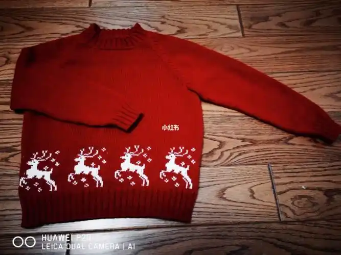 春节前给外孙女赶织一件小鹿红色毛衣