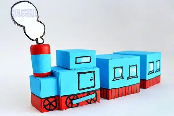 中班废物利用手工:怎么用纸盒子做小火车玩具(步骤图解)3