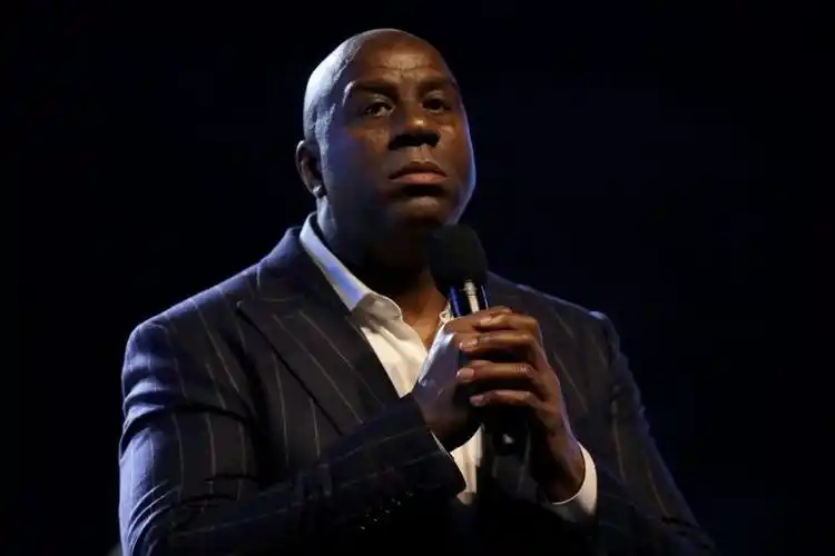 magic johnson hopeful nba can crown a champion despite