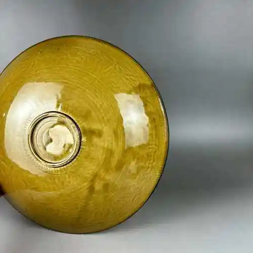 定窑酱釉印工仙鹤缠枝花卉盘