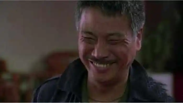 苦笑无奈心酸的图片周星驰的苦笑吴孟达的无奈