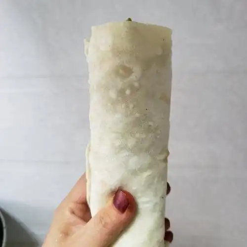 第13步,卷起来,即食.如图所示!