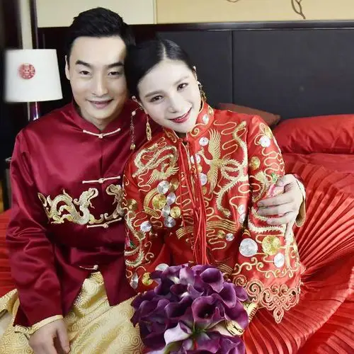 跳水金童玉女秦凯何姿完婚 奥运赛场留浪漫(图)