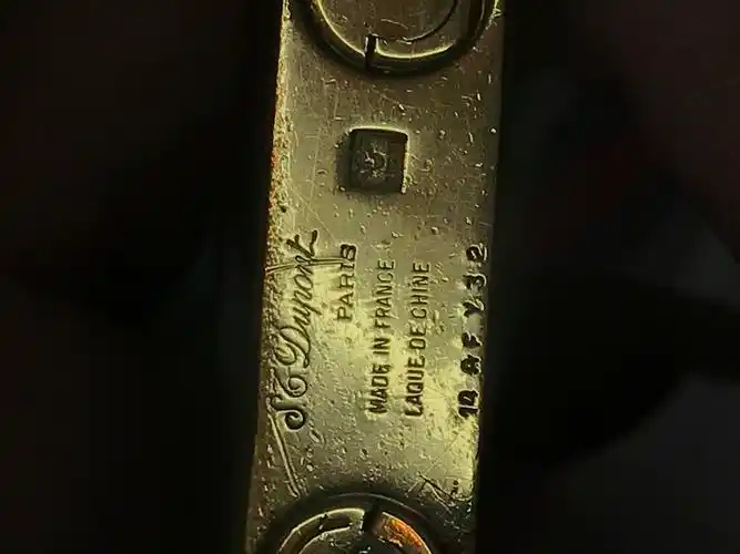 请问这款都彭打火机型号多少?