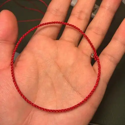 超细的四股编红绳手链